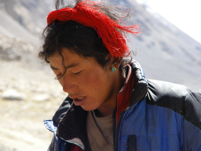 Young man from Tingre that runs a horse cart carrying tourist to Everest Base Camp.